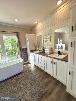 Bathroom, Dual Sink Vanities, Free Standing Baths, Interior, Recessed Lighting, Wood Texture Flooring