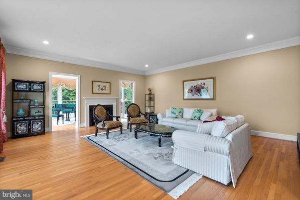 Fireplace, Interior, Living room, Piano, Recessed Lighting, Wood Texture Flooring