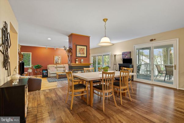 Dining room, Fireplace, Interior, Living room, Pendant Lights, Piano, Recessed Lighting, Wood Texture Flooring