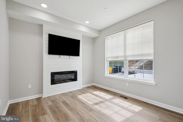 Empty room, Fireplace, Interior, Recessed Lighting, Wood Texture Flooring