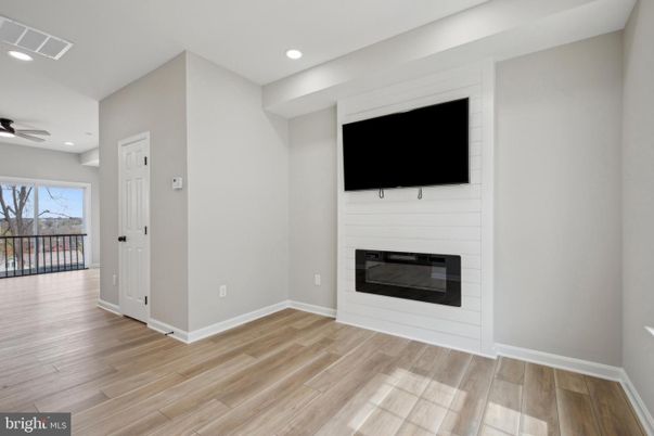 Empty room, Fireplace, Interior, Recessed Lighting, Wood Texture Flooring
