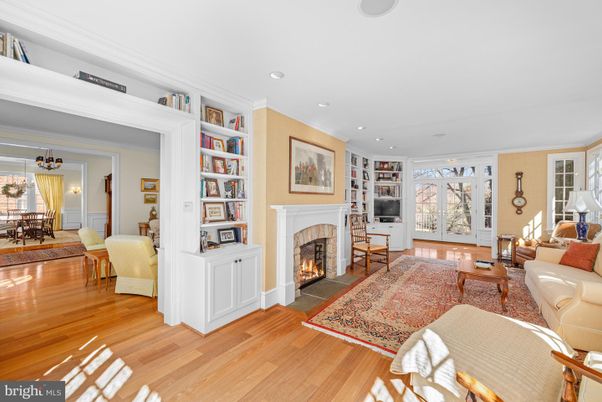 Chandelier, Dining room, Fireplace, Interior, Living room, Recessed Lighting, Wood Texture Flooring