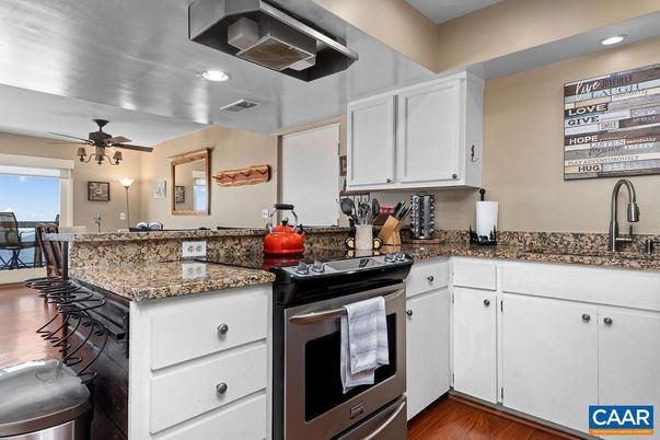 Dining room, Interior, Kitchen, Recessed Lighting, Stainless Steel Appliances, Wood Texture Flooring