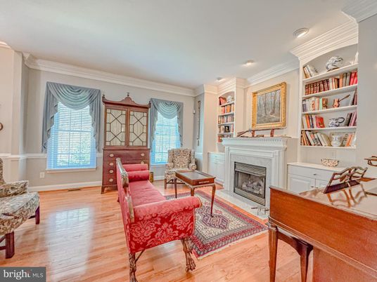 Fireplace, Interior, Living room, Piano, Recessed Lighting, Wood Texture Flooring