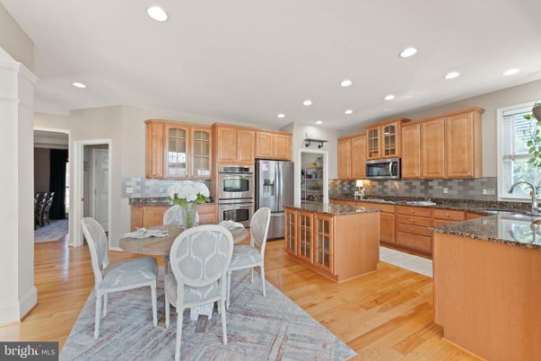 Dining room, Interior, Kitchen, Recessed Lighting, Stainless Steel Appliances, Wood Texture Flooring