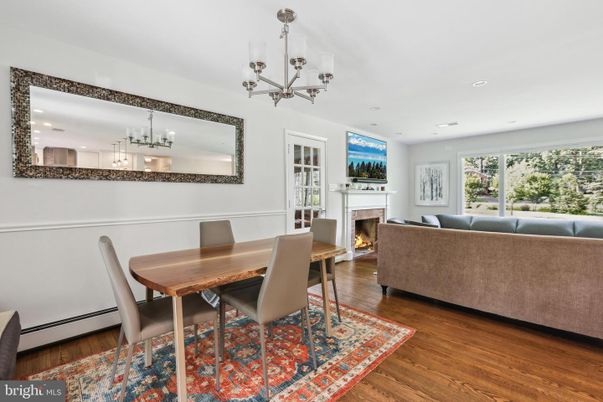 Chandelier, Dining room, Fireplace, Interior, Living room, Recessed Lighting, Wood Texture Flooring