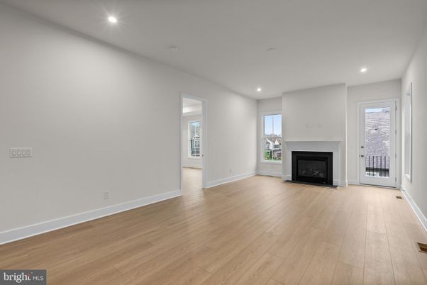Empty room, Fireplace, Interior, Recessed Lighting, Wood Texture Flooring