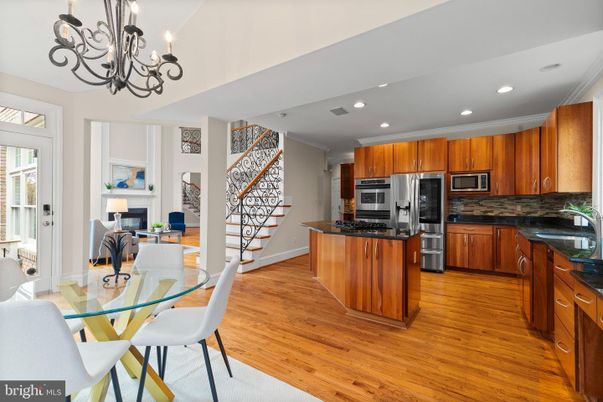Chandelier, Dining room, Interior, Kitchen, Recessed Lighting, Stainless Steel Appliances, Wood Texture Flooring