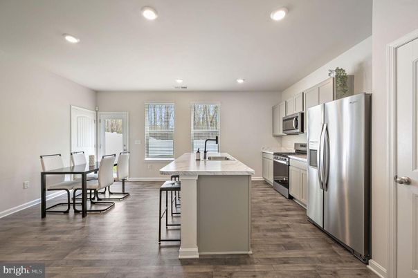 Dining room, Interior, Kitchen, Recessed Lighting, Stainless Steel Appliances, Wood Texture Flooring