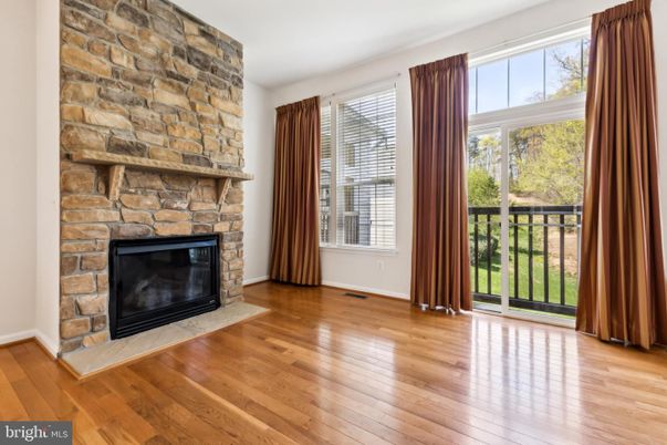 Empty room, Fireplace, Interior, Stone Walls, Wood Texture Flooring