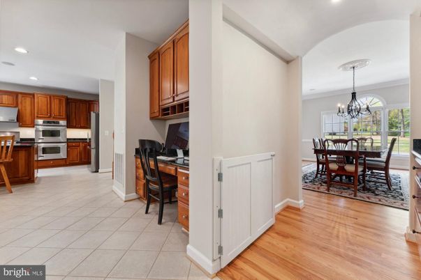 Chandelier, Dining room, Interior, Kitchen, Recessed Lighting, Stainless Steel Appliances, Wood Texture Flooring