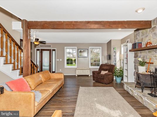 Fireplace, Interior, Living room, Recessed Lighting, Stone Walls, Wood Texture Flooring