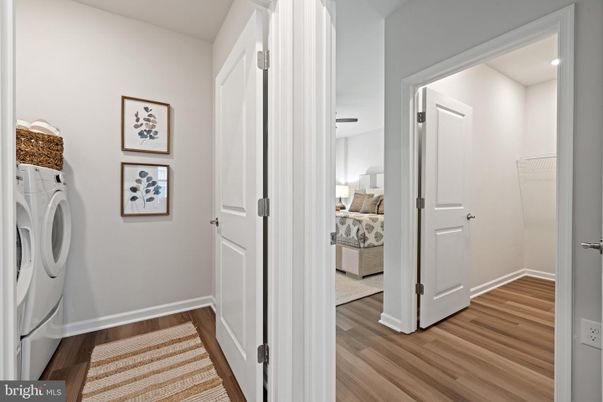 Bedroom, Interior, Utility Closets, Washer, Wood Texture Flooring