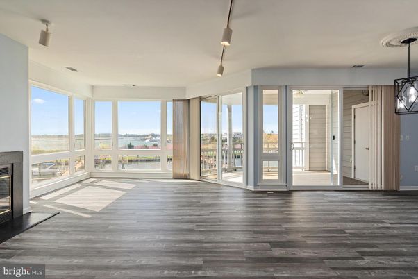 Empty room, Fireplace, Interior, Pendant Lights, Wood Texture Flooring