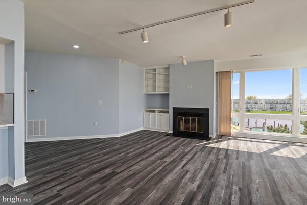 Empty room, Fireplace, Interior, Recessed Lighting, Wood Texture Flooring