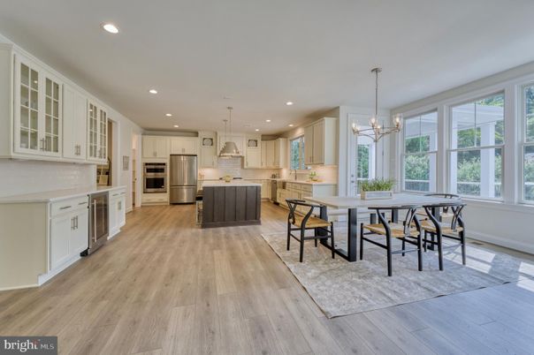Chandelier, Dining room, Interior, Kitchen, Pendant Lights, Recessed Lighting, Stainless Steel Appliances, Wood Texture Flooring