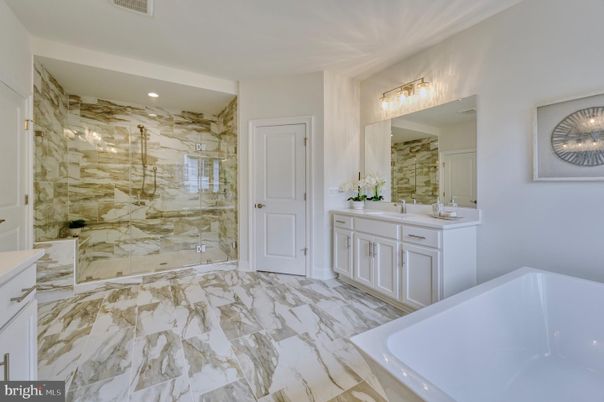 Bathroom, Dual Sink Vanities, Glass Shower, Interior, Marble, Marble Walls, Recessed Lighting