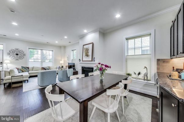 Dining room, Fireplace, Interior, Living room, Recessed Lighting, Wood Texture Flooring