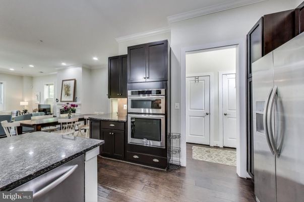 Dining room, Interior, Kitchen, Recessed Lighting, Stainless Steel Appliances, Wood Texture Flooring