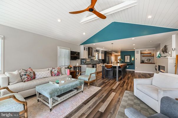 Fireplace, Interior, Kitchen, Living room, Pendant Lights, Recessed Lighting, Stainless Steel Appliances, Wood Texture Flooring