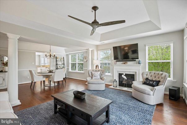 Chandelier, Dining room, Fireplace, Interior, Living room, Pendant Lights, Wood Texture Flooring
