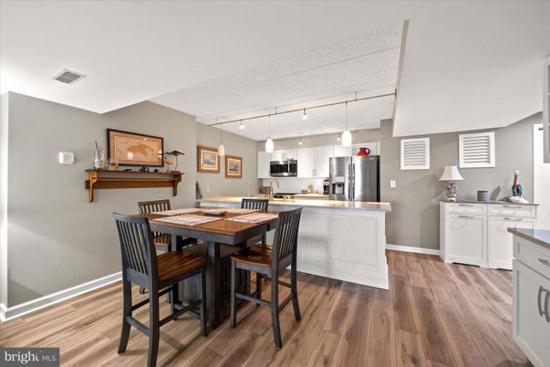 Dining room, Interior, Kitchen, Pendant Lights, Stainless Steel Appliances, Wood Texture Flooring