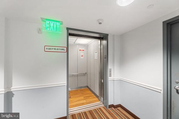 Elevator, Interior, Recessed Lighting, Wood Texture Flooring