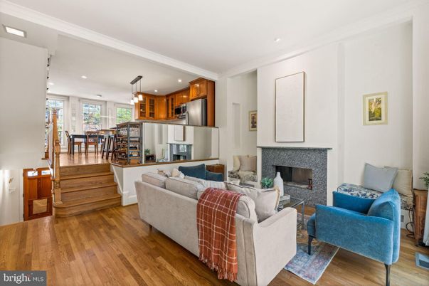 Dining room, Fireplace, Interior, Kitchen, Living room, Pendant Lights, Recessed Lighting, Stainless Steel Appliances, Wood Texture Flooring