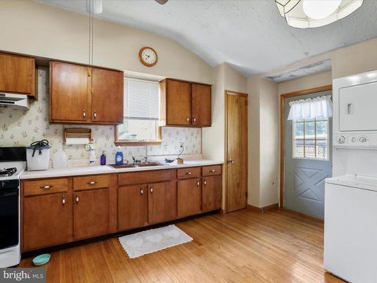 Interior, Kitchen, Pendant Lights, Washer, Wood Texture Flooring
