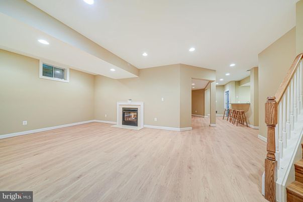 Empty room, Fireplace, Interior, Recessed Lighting, Wood Texture Flooring