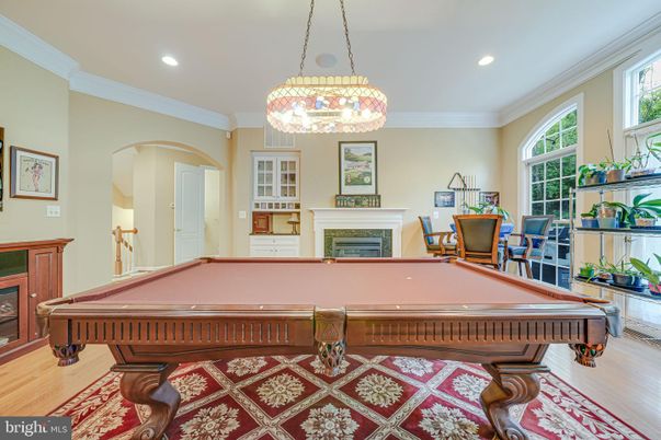 Billiard Table, Fireplace, Game Room, Interior, Pendant Lights, Recessed Lighting, Wood Texture Flooring