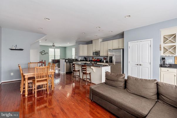 Dining room, Interior, Kitchen, Living room, Recessed Lighting, Stainless Steel Appliances, Wood Texture Flooring