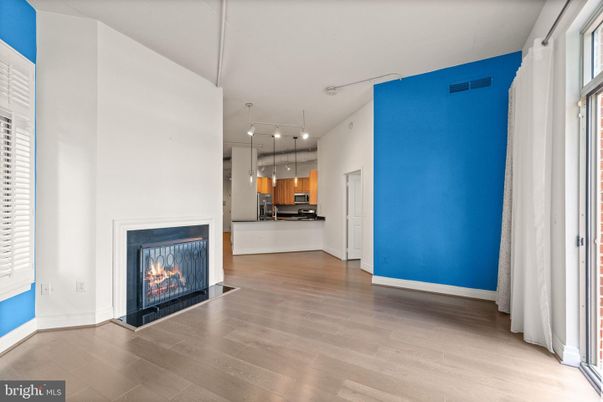 Empty room, Fireplace, Interior, Kitchen, Pendant Lights, Wood Texture Flooring