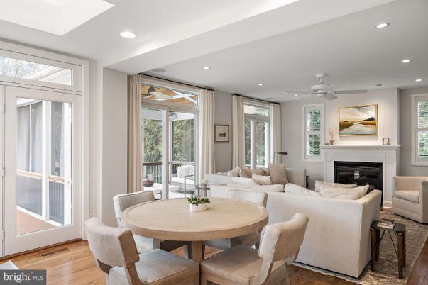 Dining room, Fireplace, Interior, Living room, Recessed Lighting, Wood Texture Flooring