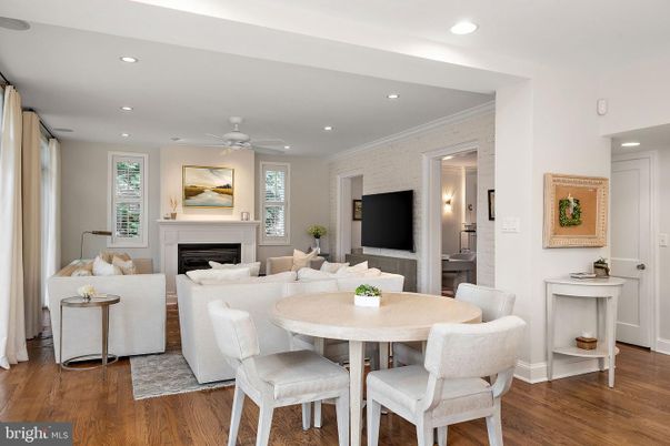 Dining room, Fireplace, Interior, Living room, Recessed Lighting, Wood Texture Flooring