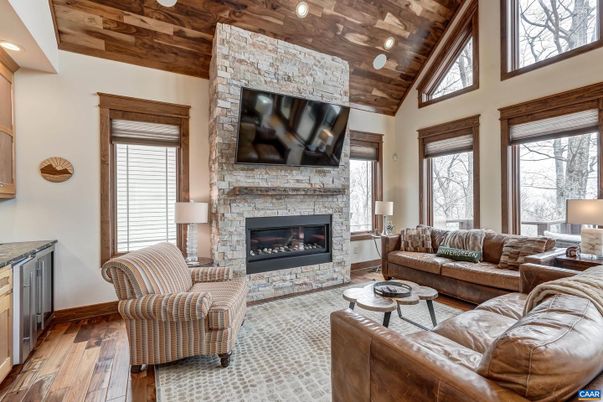 Fireplace, Interior, Living room, Recessed Lighting, Stone Walls, Wooden Ceilings, Wood Texture Flooring