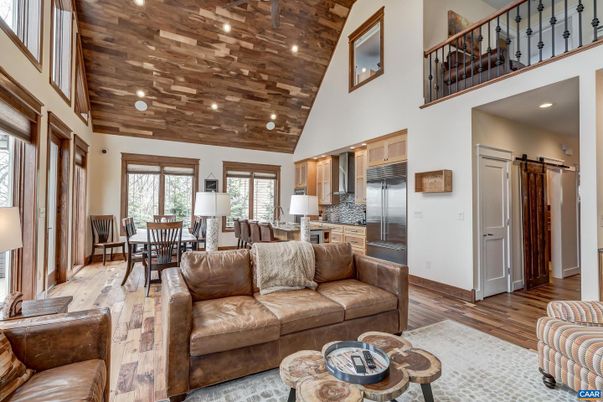 Dining room, Interior, Kitchen, Living room, Recessed Lighting, Stainless Steel Appliances, Wooden Ceilings, Wood Texture Flooring
