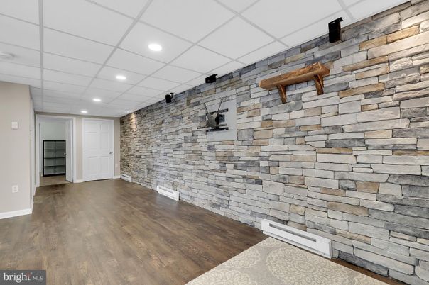 Empty room, Interior, Recessed Lighting, Stone Walls, Wood Texture Flooring