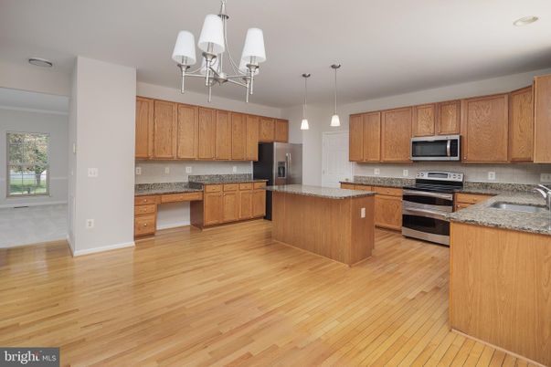 Chandelier, Interior, Kitchen, Pendant Lights, Stainless Steel Appliances, Wood Texture Flooring