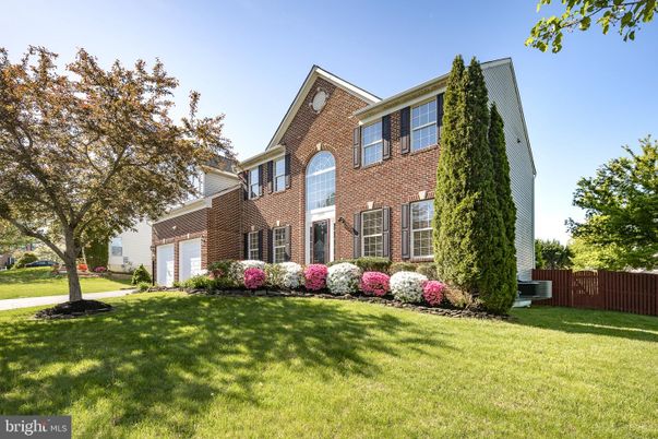 Attached, Backyard, Exterior, Facade, Brick Facade, Brick Traditional