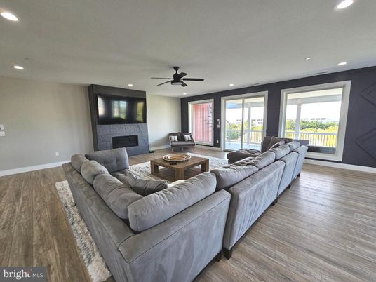 Fireplace, Interior, Living room, Recessed Lighting, Wood Texture Flooring