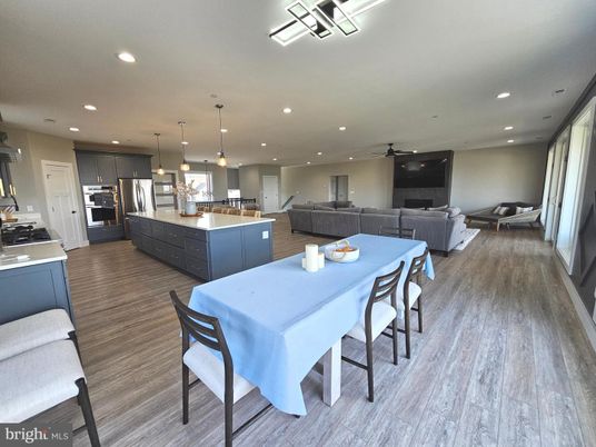 Dining room, Interior, Kitchen, Living room, Pendant Lights, Recessed Lighting, Stainless Steel Appliances, Wood Texture Flooring