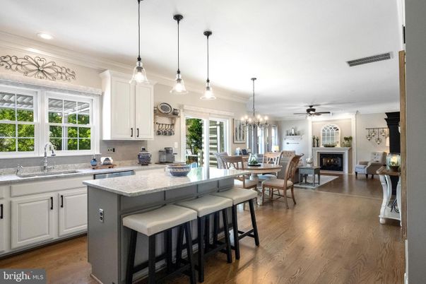Chandelier, Dining room, Fireplace, Interior, Kitchen, Living room, Pendant Lights, Recessed Lighting, Wood Texture Flooring