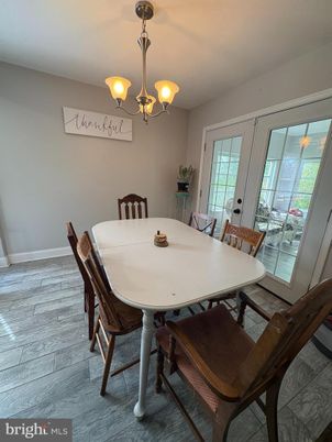 Chandelier, Dining room, Interior, Wood Texture Flooring