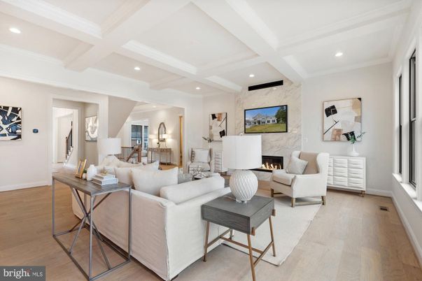 Fireplace, Interior, Living room, Marble Walls, Recessed Lighting, Wood Texture Flooring