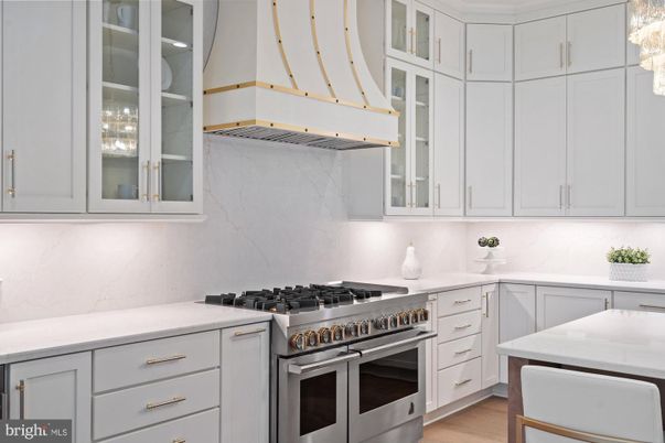 Interior, Kitchen, Marble Walls, Stainless Steel Appliances, Wood Texture Flooring