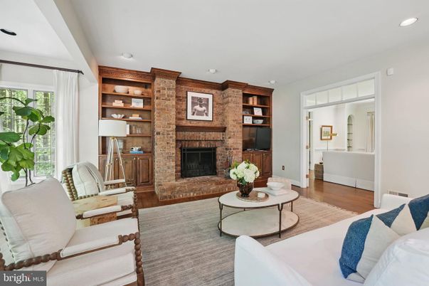 Fireplace, Interior, Living room, Recessed Lighting, Stone Walls, Wood Texture Flooring
