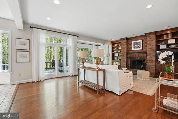 Fireplace, Interior, Living room, Recessed Lighting, Stone Walls, Wood Texture Flooring