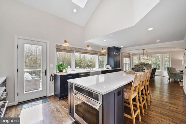 Chandelier, Dining room, Interior, Kitchen, Recessed Lighting, Stainless Steel Appliances, Wood Texture Flooring