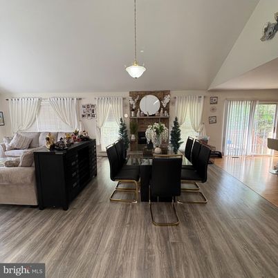 Dining room, Fireplace, Interior, Living room, Pendant Lights, Wood Texture Flooring